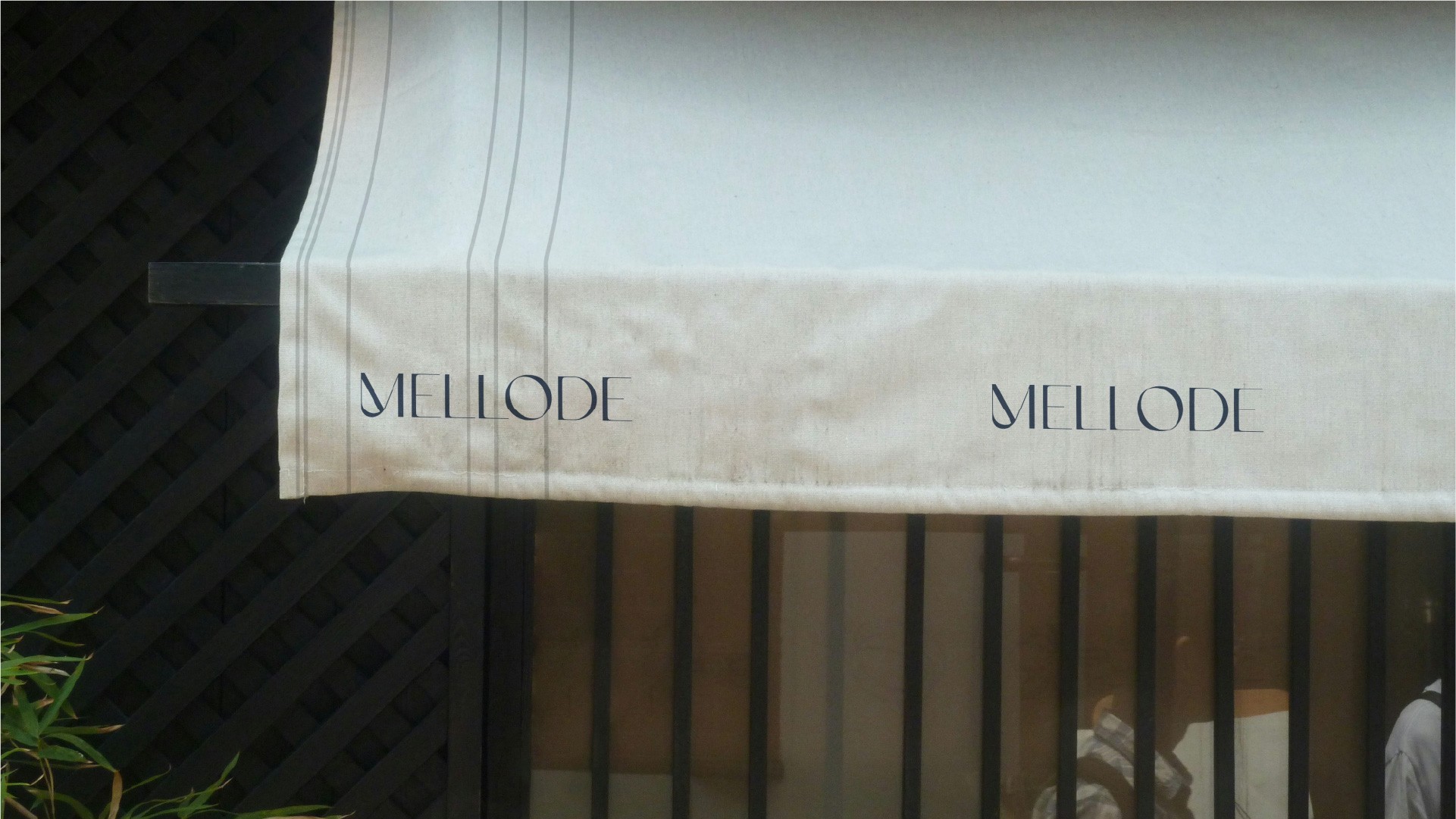 Graphic depicting UI-styled buttons with different categories of interior design items on top of an image of a modern interior living room.